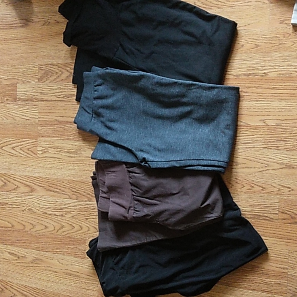 Four pair of maternity dress pants size small.